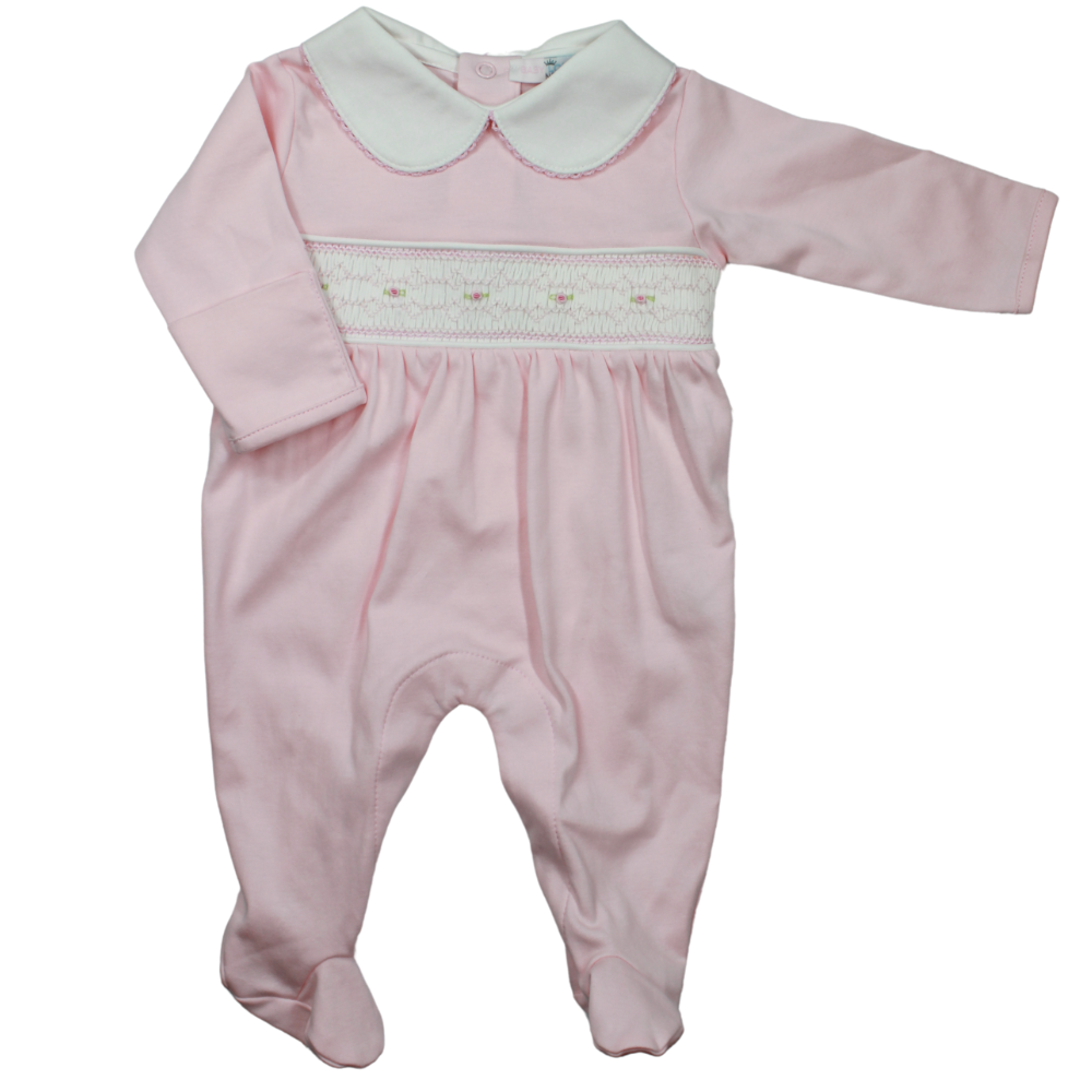 A pink long-sleeved baby footie with a smocked chest area and a Peter Pan collar, designed for newborns.