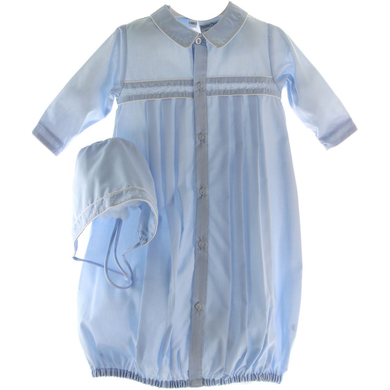A baby boys blue gown with collar with bonnet to take baby boy home from hospital. Classic dressy style