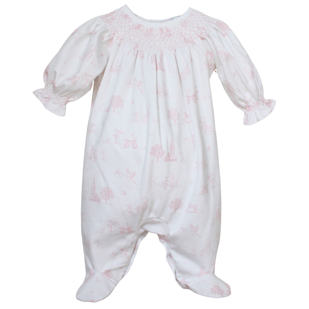 White baby romper with pink floral pattern on a white background