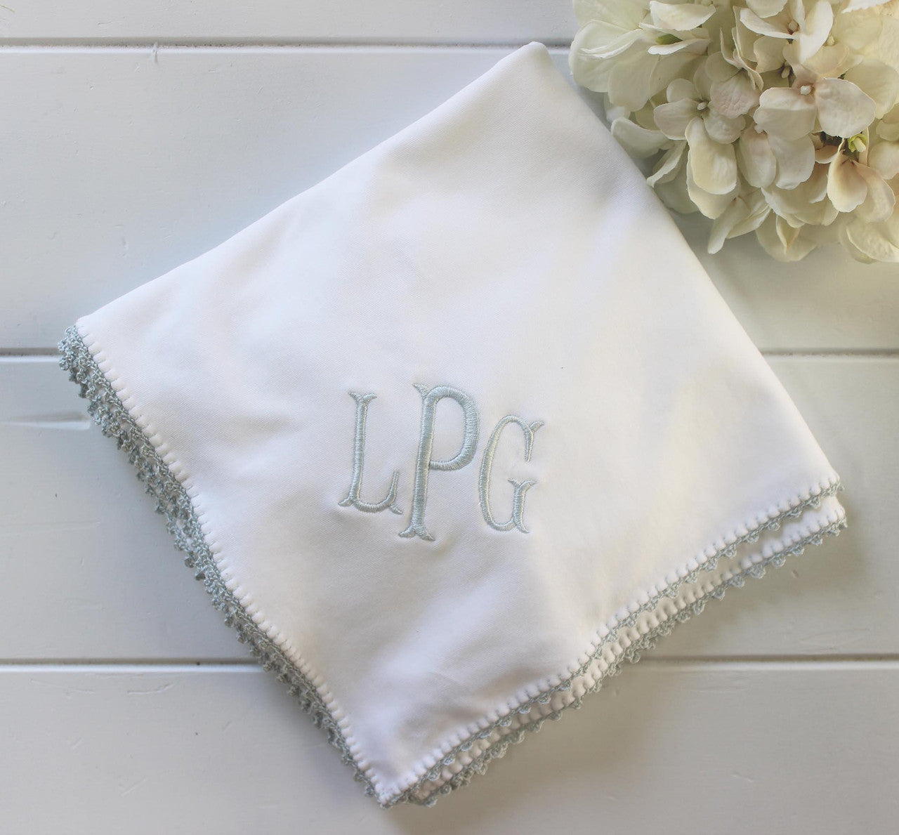 white lily crochet blanket Pixie Lily Boys Receiving Blanket White Blue Crochet Trim Newborn